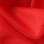 Red acetate fabric for garment lining.