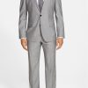 Mens 2 button suit in silk and wool blend.