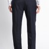 Navy blue pinstripe three-piece suit pants back view.