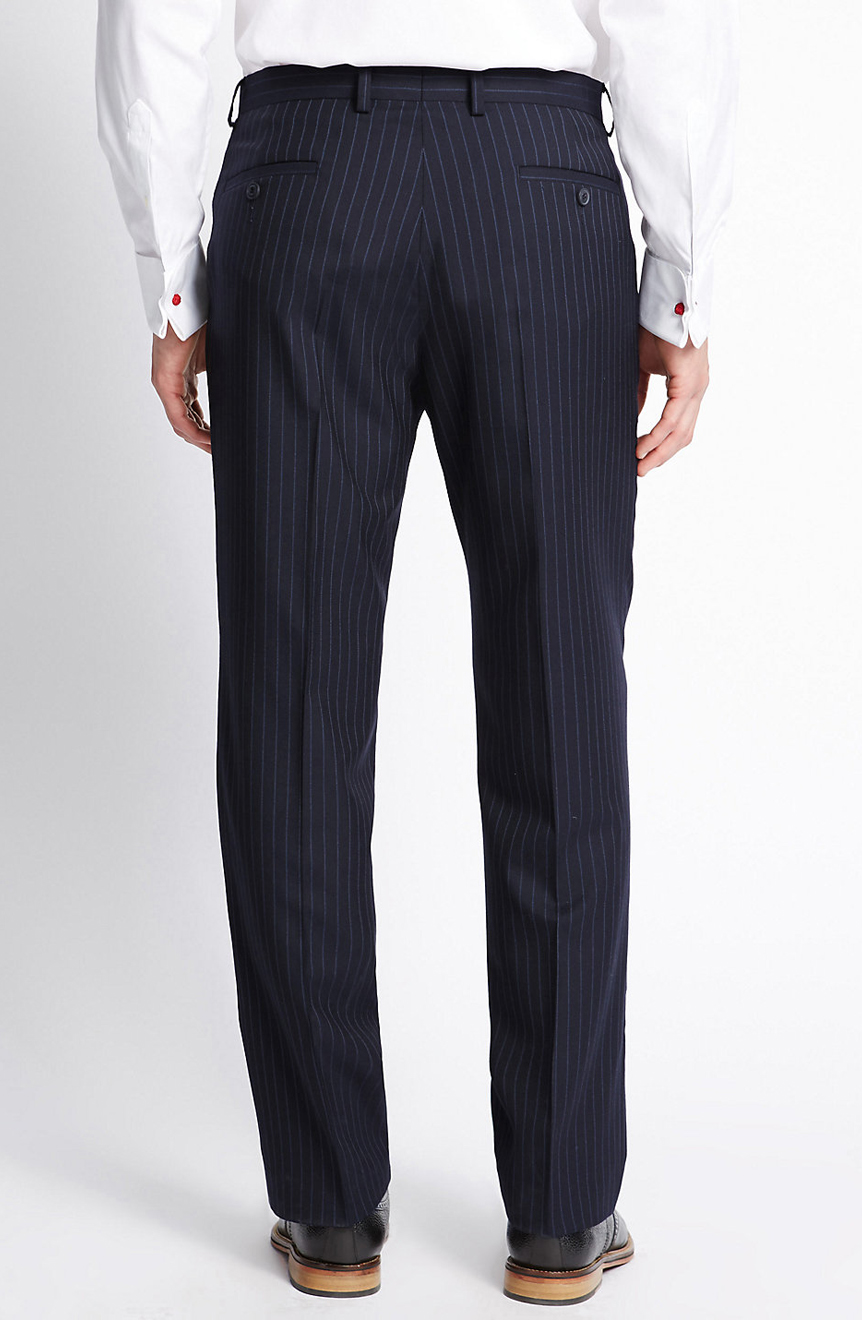 Navy blue pinstripe three-piece suit pants back view.