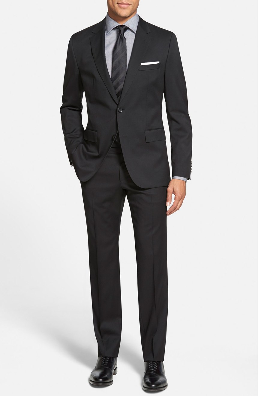 Mens black suit in tropical wool, a full front view.