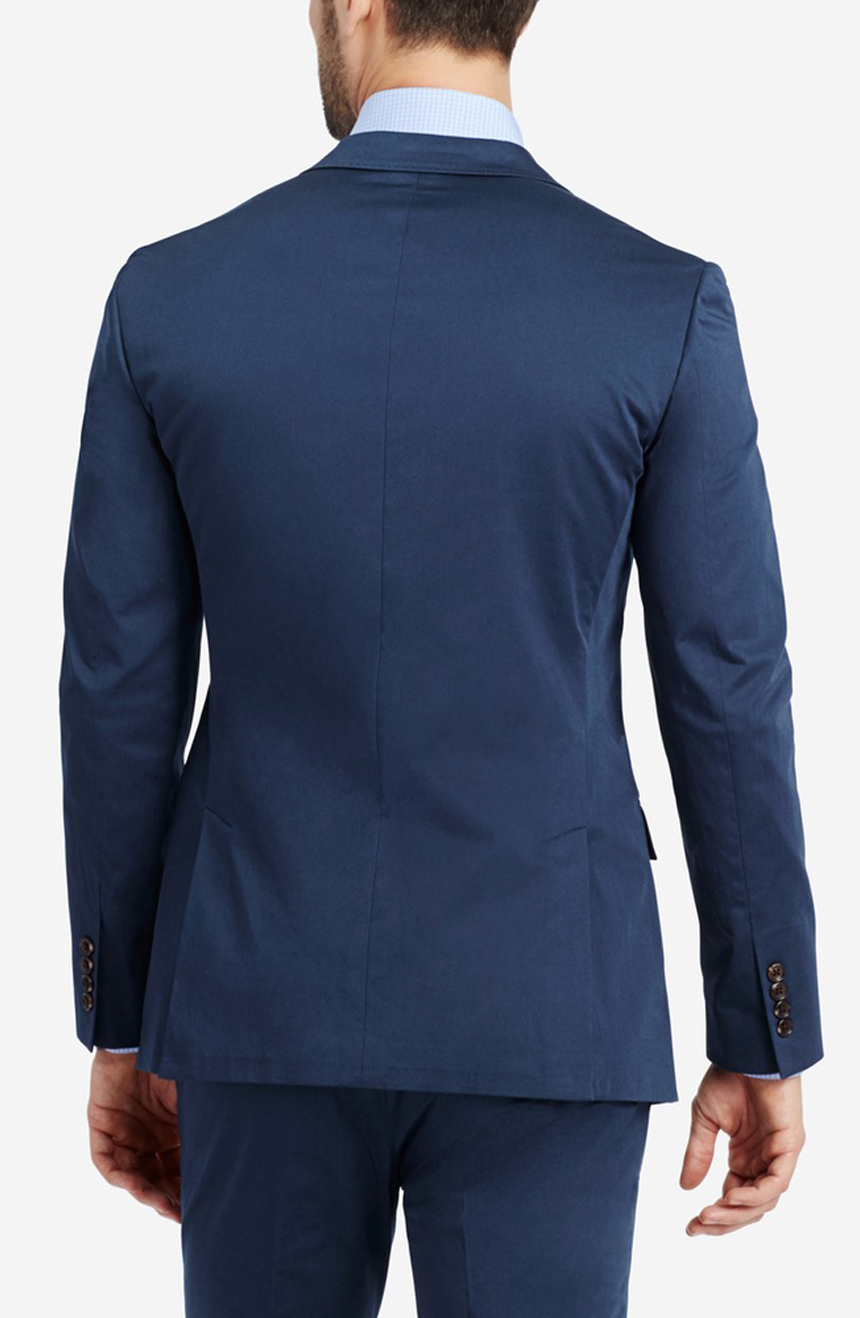 Slim fit unstructured cotton suit jacket close-up back view.