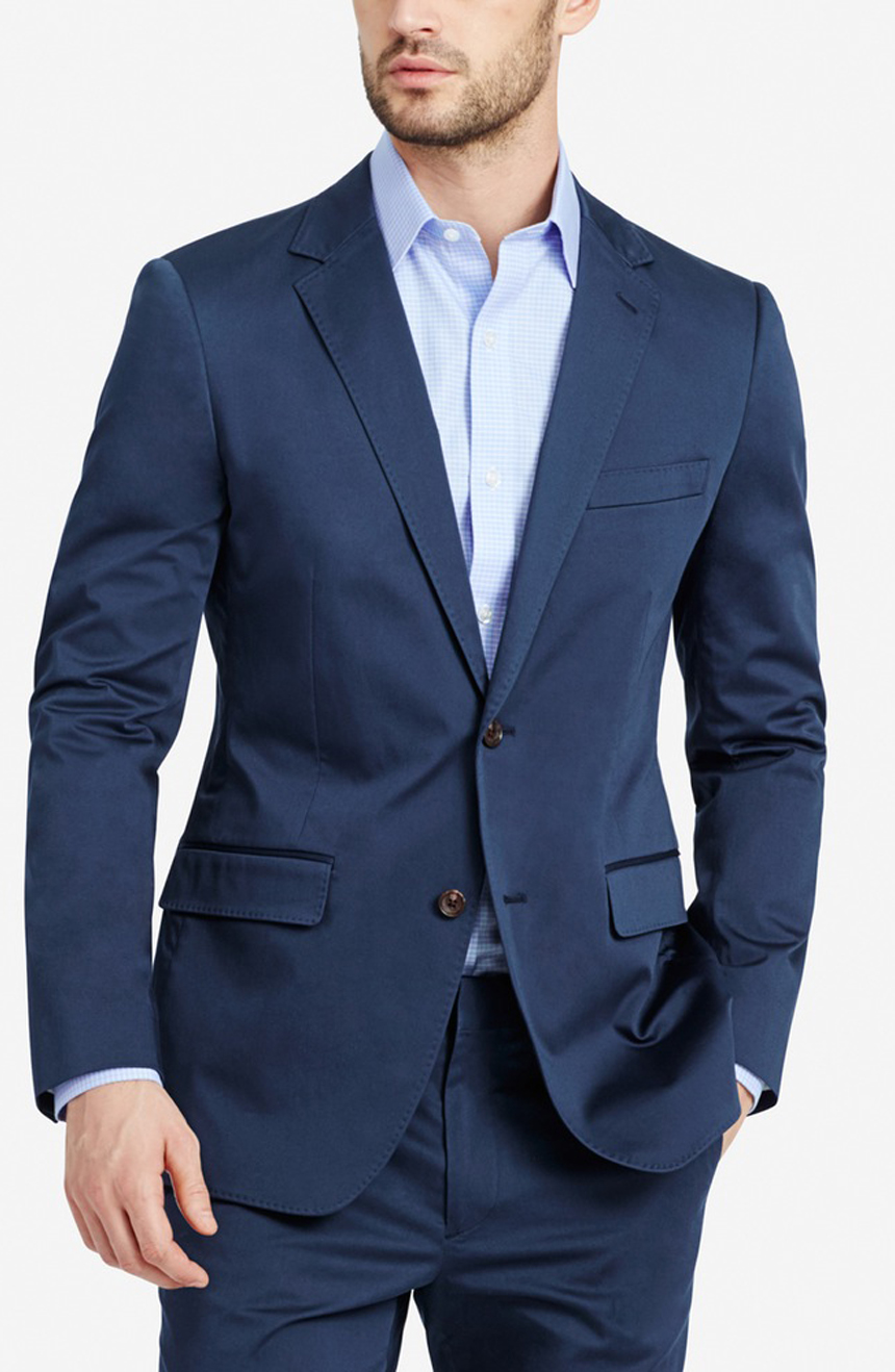 Slim fit unstructured cotton suit jacket close-up view.
