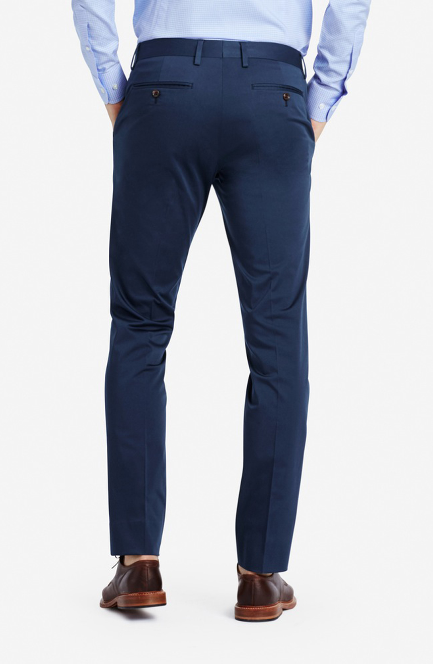 Slim fit unstructured cotton suit pants full back view.