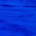 Dupioni silk fabric in blue color ideal for suits, jackets, blazers, pants, dresses, skirts, and vests.