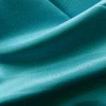 Sea blue acetate fabric for garment lining.