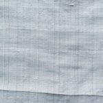 Dupioni silk fabric in silver color ideal for suits, jackets, blazers, pants, dresses, skirts, and vests.