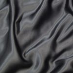 Charcoal satin silk for shirts, dresses, linings, and more.