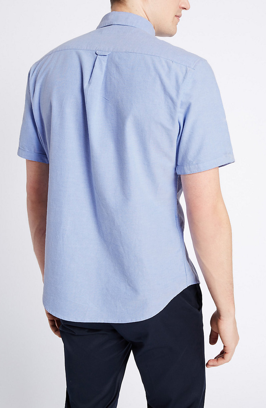 Light blue short sleeve Oxford shirt full back view.