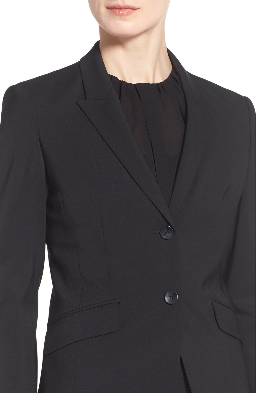 Women's pants suit jacket in tropical wool close view.