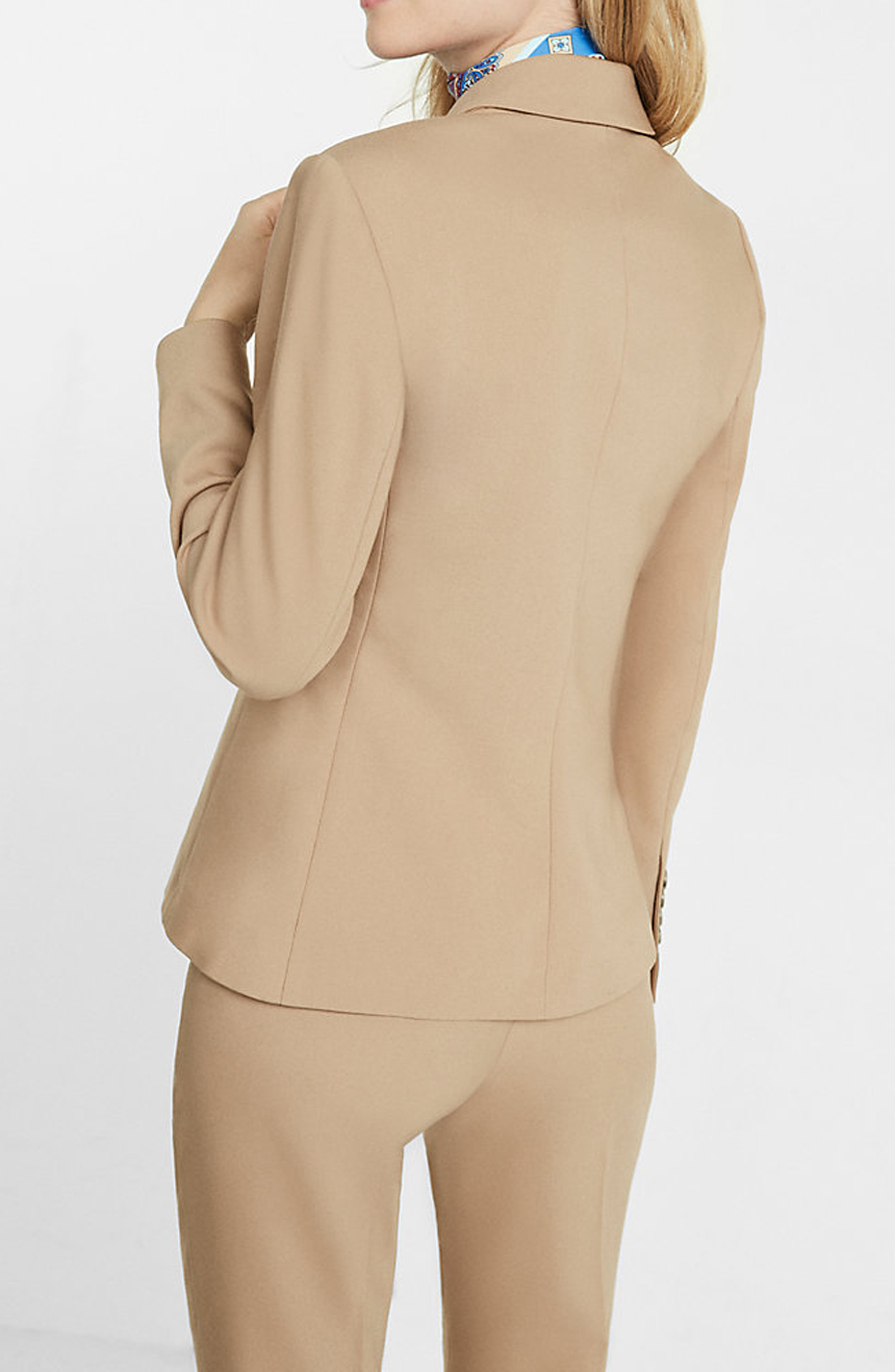 Womens tan wedding suit back view.