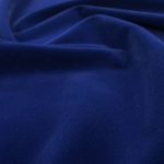 100% cotton velvet in blue suitable for suits, coats, dresses, and pants.