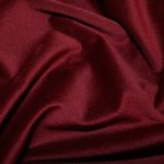 100% cotton velvet in burgundy suitable for suits, coats, dresses, and pants.