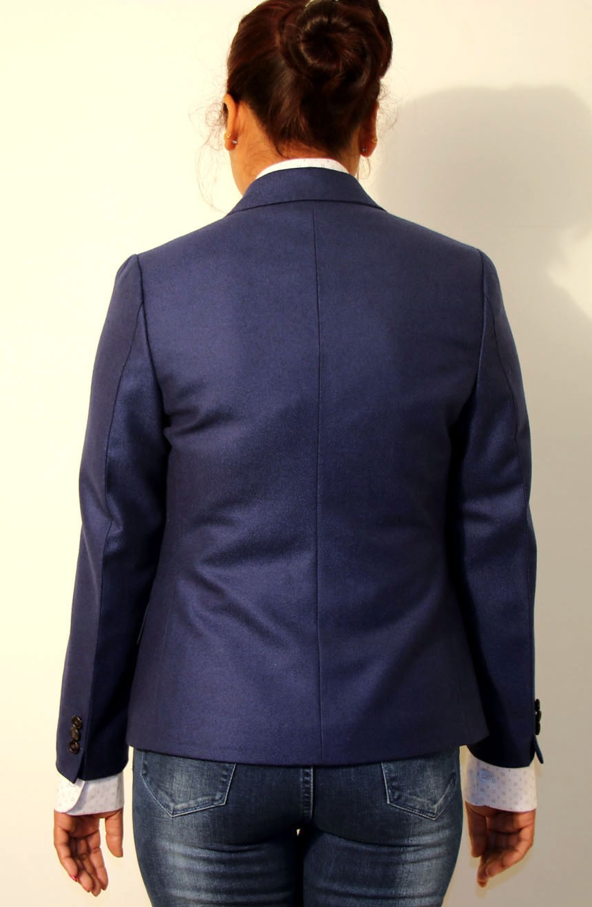 Womens fitted blazer full back view.