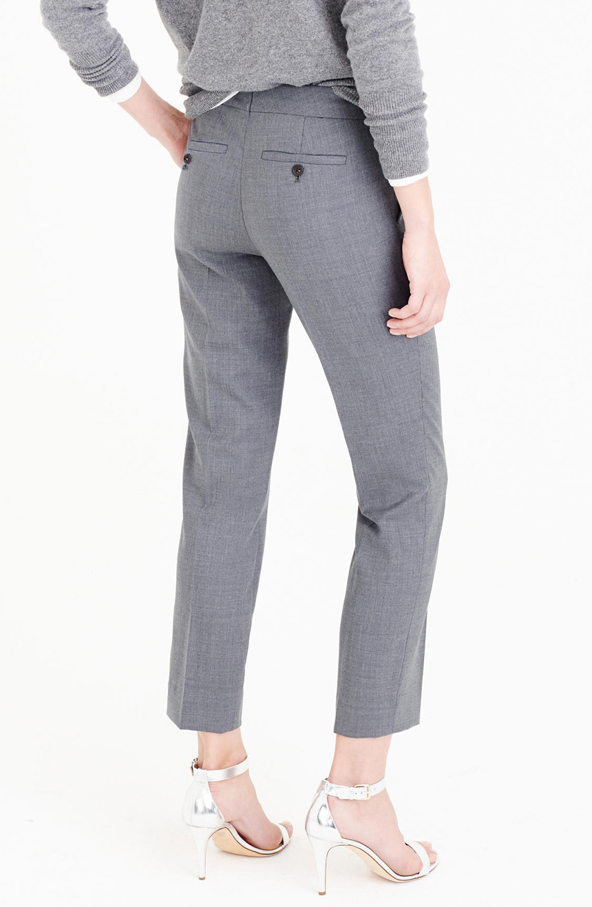 Women's mid-rise tapered leg dress pants full back view.