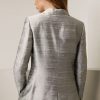 Womens silk jacket in dupioni silk full back view.