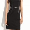 Black dress with leather trims in sleeveless cut with zipper back closure.