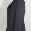 James Bond navy pinstripe 3-piece suit from Casino Royal final scene. Suit jacket full side view.