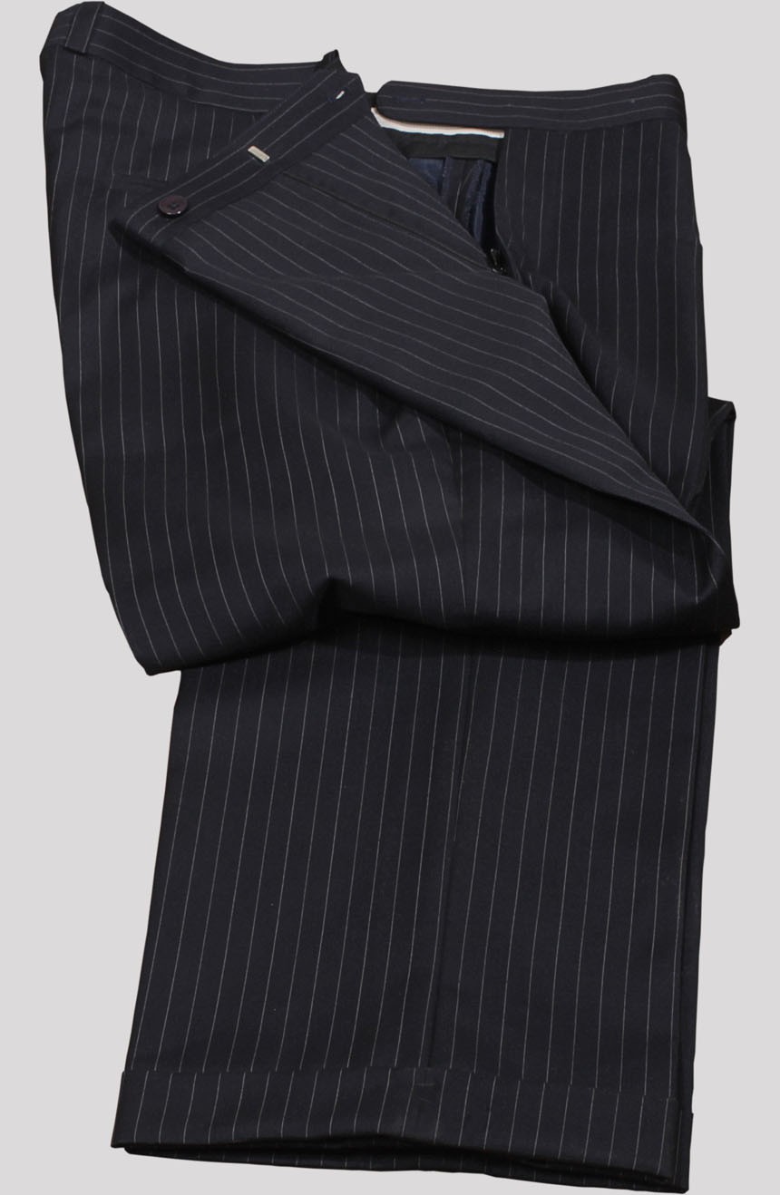 James Bond navy pinstripe 3-piece suit from Casino Royal final scene. Suit pants front closure view.