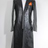 Joker trench coat in black leather inspired from The Dark Knight. A full front view.