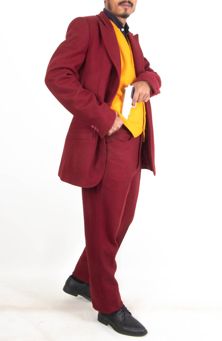 Arthur Fleck Joker suit replica starring Joaquin Phoenix in the 2019 Joker movie. Suit profile view.