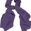 Mens 100% cashmere scarf in indigo carmine, single-ply with 1-inch eyelash fringe.