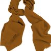 Mens 100% cashmere scarf in carrot orange, single-ply with 1-inch eyelash fringe.