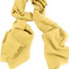 Mens 100% cashmere scarf in butterscotch, single-ply with 1-inch eyelash fringe.