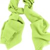 Mens 100% cashmere scarf in chartreuse green, single-ply with 1-inch eyelash fringe.