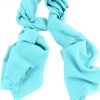 Mens 100% cashmere scarf in Celeste blue, single-ply with 1-inch eyelash fringe.