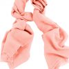 Mens 100% cashmere scarf in peppermint orange, single-ply with 1-inch eyelash fringe.