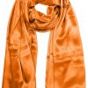 Womens silk neck scarf in pumpkin 22×75 inches with plenty of material to wrap around the head or shoulders in many ways.