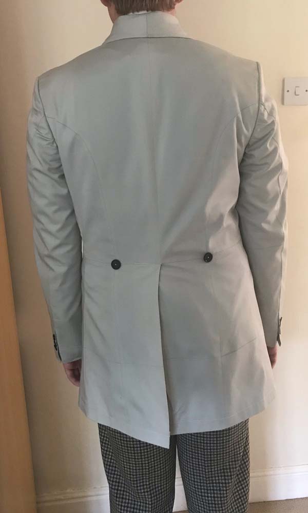 1st Doctor Who black dress coat try-on test garment, full back view.