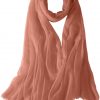 Featherlight cashmere scarf in rose brown color, pocketable, lightweight, & ultra-soft to keep you warm weigh just ounces, essential for all women.