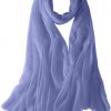 Featherlight cashmere scarf in aniline blue color, pocketable, lightweight, & ultra-soft to keep you warm weigh just ounces, essential for all women.