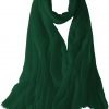 Featherlight cashmere scarf in hunter green color, pocketable, lightweight, & ultra-soft to keep you warm weigh just ounces, essential for all women.