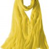Featherlight cashmere scarf in butterscotch color, pocketable, lightweight, & ultra-soft to keep you warm weigh just ounces, essential for all women.
