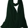 Featherlight cashmere scarf in forest green color, pocketable, lightweight, & ultra-soft to keep you warm weigh just ounces, essential for all women.