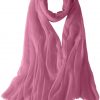Featherlight cashmere scarf in pastel pink color, pocketable, lightweight, & ultra-soft to keep you warm weigh just ounces, essential for all women.