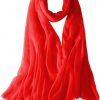 Featherlight cashmere scarf in red color, pocketable, lightweight, & ultra-soft to keep you warm weigh just ounces, essential for all women.