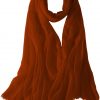 Featherlight cashmere scarf in orange brick color, pocketable, lightweight, & ultra-soft to keep you warm weigh just ounces, essential for all women.
