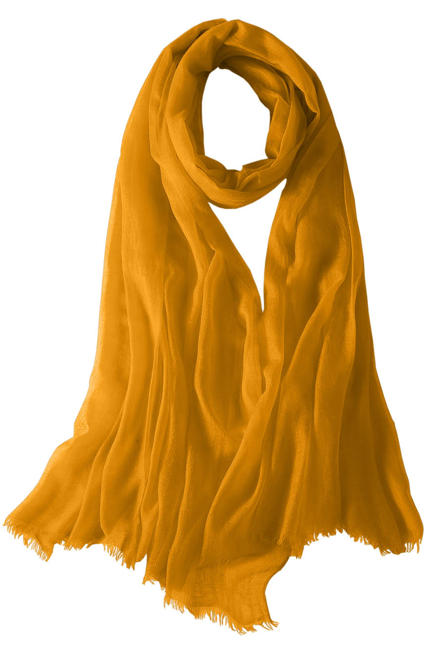 Featherlight cashmere scarf in honey color, pocketable, lightweight, & ultra-soft to keep you warm weigh just ounces, essential for all women.