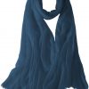 Featherlight cashmere scarf in teal blue color, pocketable, lightweight, & ultra-soft to keep you warm weigh just ounces, essential for all women.