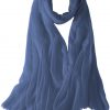 Featherlight cashmere scarf in slate blue color, pocketable, lightweight, & ultra-soft to keep you warm weigh just ounces, essential for all women.