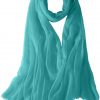 Featherlight cashmere scarf in aquamarine color, pocketable, lightweight, & ultra-soft to keep you warm weigh just ounces, essential for all women.