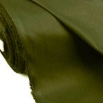 Lightweight green olive cotton fabric for trims and piping in the custom-made garments.