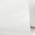 Lightweight white color cotton fabric for trims and piping in the custom-made garments.